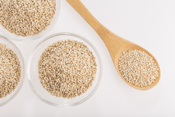 Quinoa grains in bowl isolated on white background, Chenopodium quinoa