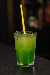 Colored cocktail on the bar in the nightclub