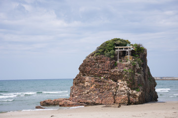 Fototapeta na wymiar Shrine on a rock