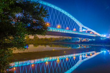 Night view of puente del tercer millenio bridge in Zaragoza, Spain