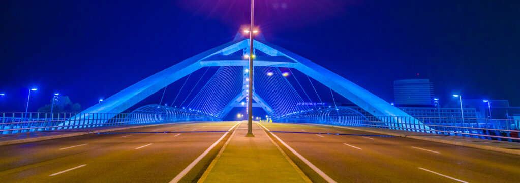 Night view of puente del tercer millenio bridge in Zaragoza, Spain