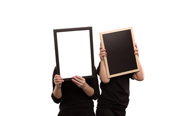 isolated on white background boy and girl in black T-shirts show blank forms