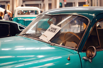 Classic american vintage car for sale on a historic motor exhibition