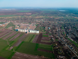 Fototapeta na wymiar Aerial view on industrial building in rural environment 