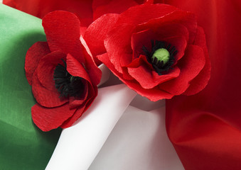 April 25 Liberation Day Text in italian card. Flower poppy and italy flag. selective focus image 