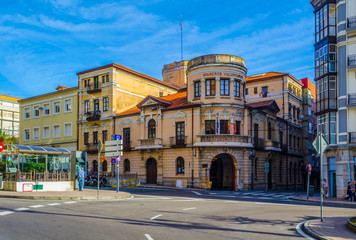 People are strolling through a street in Santander, Spain