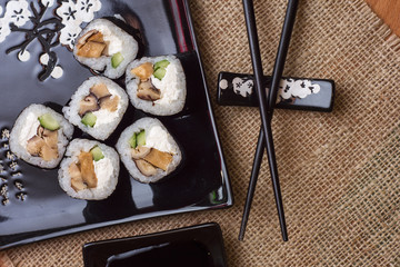 Sushi rolls  on black  table 