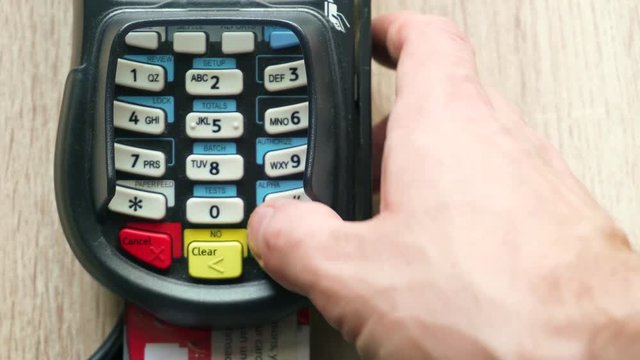 Credit Card Machine Chip And Pin Code Being Entered Overhead Pov With Hand