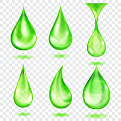 Set of translucent drops in green colors, isolated on transparent background. Transparency only in vector format