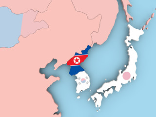 Map of North Korea with flag on globe