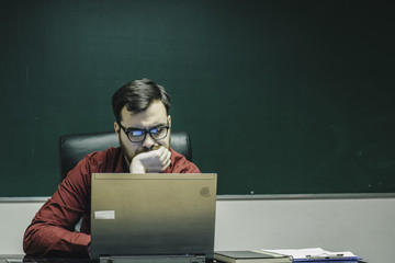 Nis / Serbia - 04/11/2018: Office worker in front of a laptop - business concept