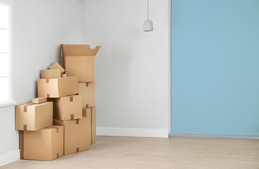 Cardboard boxes on floor indoors