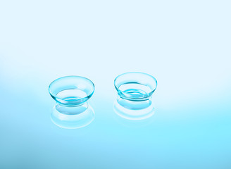 Contact lenses on color background