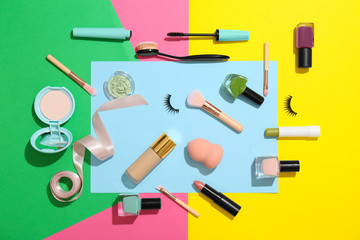 Fototapeta na wymiar Flat lay composition with cosmetic products on color background