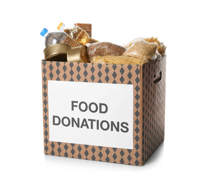 Donation box with food on white background