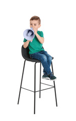 Adorable little boy with megaphone on white background