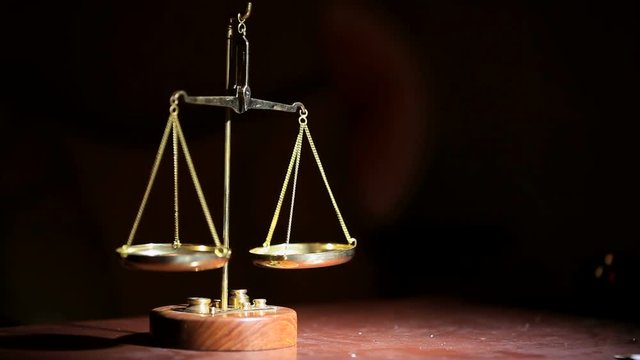 The scales are unsteady until they balance