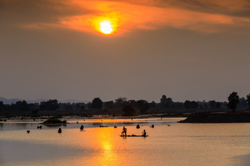 Naklejka premium Beautiful sunset on the marsh in countryside of Thailand.