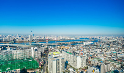 Asia business concept for real estate and corporate construction - panoramic urban city skyline aerial view under blue sky and sunny day in funabori, tokyo, Japan
