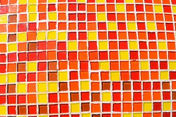Colorful mosaic  background,Many red square inserts with yellow and orange, Texture for add text or...