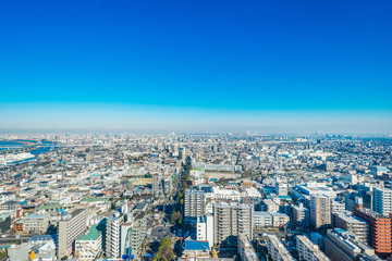 Asia business concept for real estate and corporate construction - panoramic urban city skyline aerial view under blue sky and sunny day in funabori, tokyo, Japan