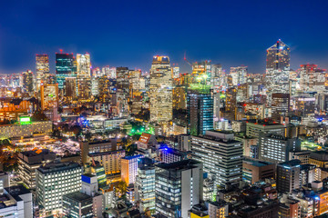 Fototapeta na wymiar Asia business concept for real estate and corporate construction - panoramic urban city skyline aerial view under twilight sky with highway junction and neon night in hamamatsucho, tokyo, Japan