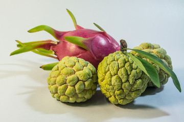 Obraz premium Fruit from Thailand country. custard apple or sugar apple, pitaya or pitahaya or dragon fruit.