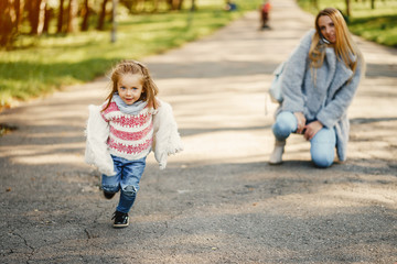 Fototapeta premium young mother with toddler