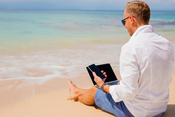 Man working on the beach
