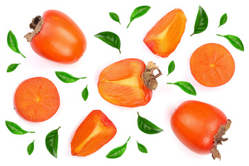 persimmon decorated with green leaves isolated on white background. Top view. Flat lay pattern