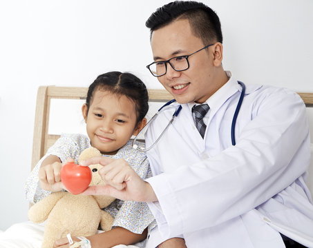 doctor with kid girl patient