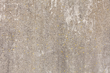 Old concrete worn texture with yellow points.