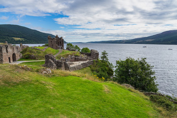 Fototapeta na wymiar Ruins of Urquhart Castle on the shores of Loch Ness lake, Highlands, Scotland, Britain