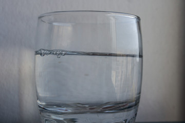 glass of water on white background