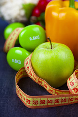 Food for diet and dumbbells