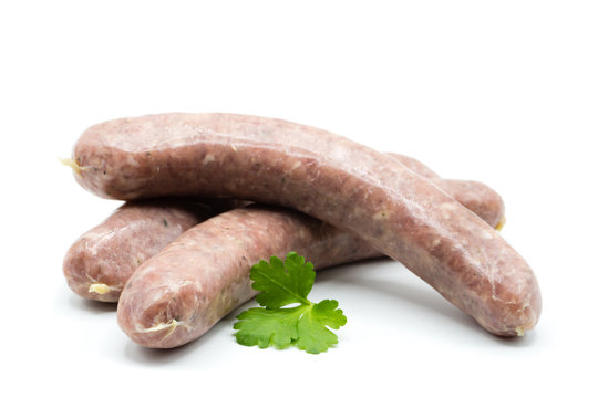 Rohe Bratwurst Grillwurst rostbratwurst isoliert freisteller freigestellt weißer Hintergrund