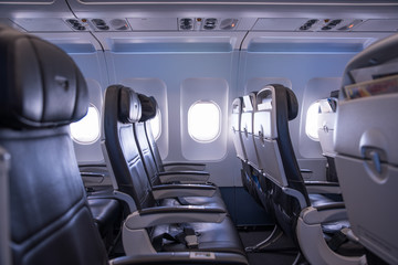 Airplane inside. Window, seats