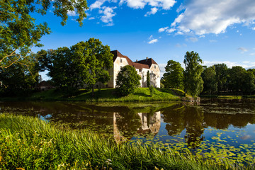 Obraz premium Jaunpils Castle is a fortified castle in the historical region of Zemgale, in Latvia