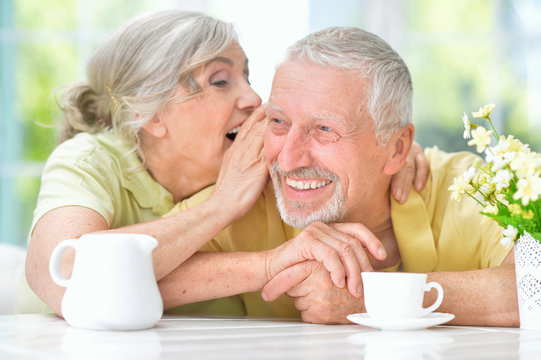 Happy senior couple drinking tea 