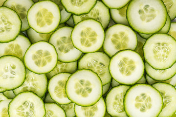 Fototapeta na wymiar Cucumber slices, full frame food background