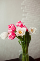 a bouquet of tulips in a vase