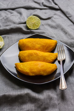 Colombian empanadas, made of meat and fried in oil.