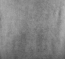 A fine texture of grey bath towel.