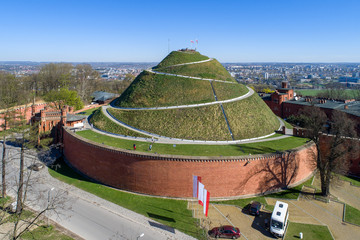 Kosciuszko Mound (Kopiec Kościuszki). Krakow landmark, Poland. Erected in 1823 to commemorate Tadedeusz Kosciuszko. Surrounded by a citadel built by Austrian Administration about 1850. Aerial view - obrazy, fototapety, plakaty