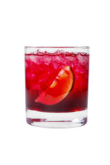 A single-colored, pink, red, transparent cocktail in a low glass with crushed ice frappe and lime slice. Side view. Isolated white background. Drink for the menu restaurant, bar, cafe