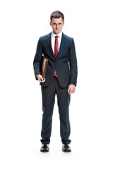Full body portrait of businessman with folder on white