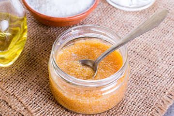 Pike caviar in a glass jar on the table