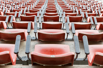 Naklejka premium Empty red seats in stadium.