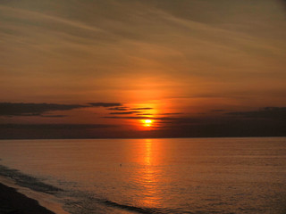 Fototapeta na wymiar Slow shutter seascape view and beautiful sunrise