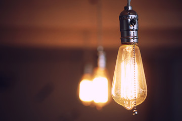 Lamps with tungsten filament. Edison's light bulb. Filament fila